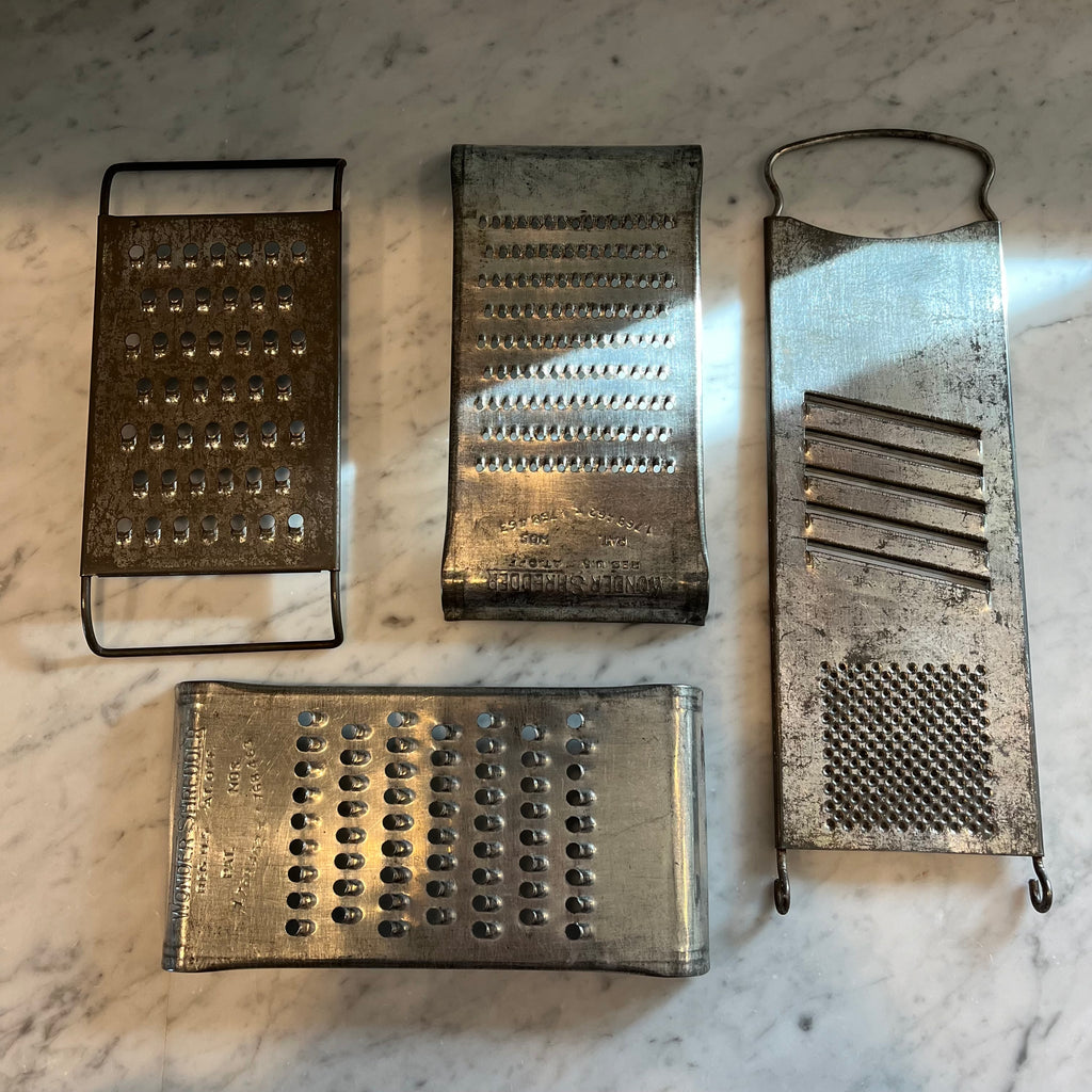 vintage tin cheese graters