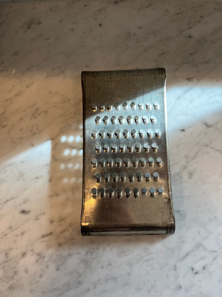 vintage tin cheese graters