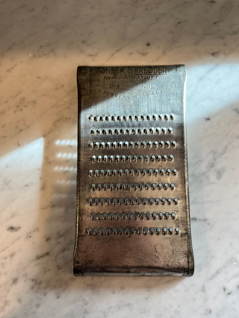 vintage tin cheese graters